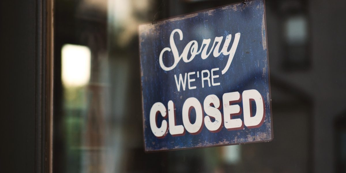 blue-and-white-sorry-we-re-closed-wooden-signage-1171386